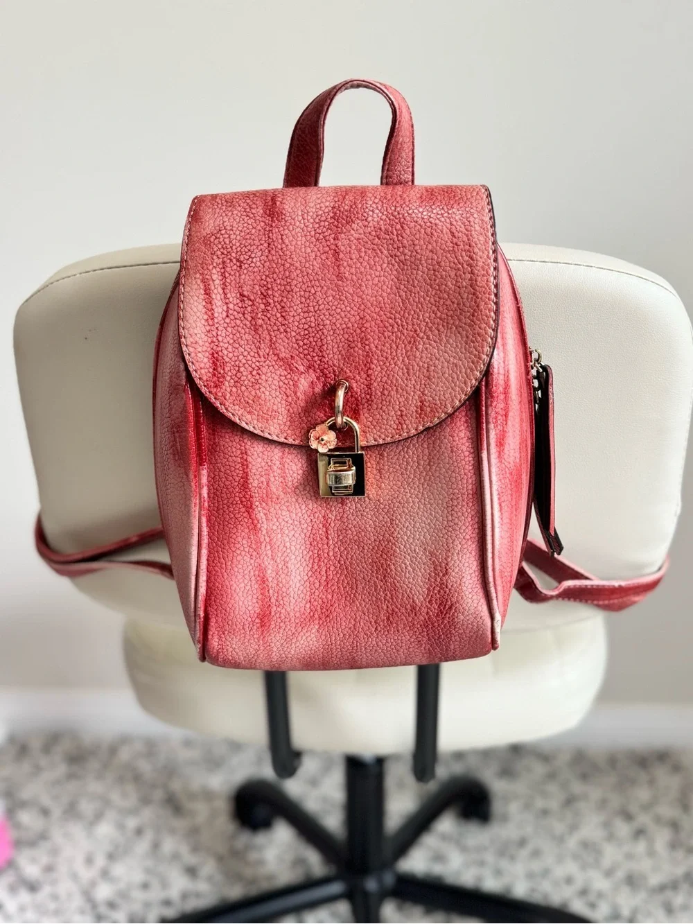 Distressed Circle Backpack With Red Flower lock Accent